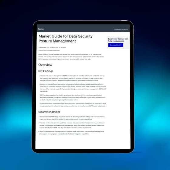 A tablet shows the front page of the Gartner Market Guide for DSPM, in front of a dark blue textured background