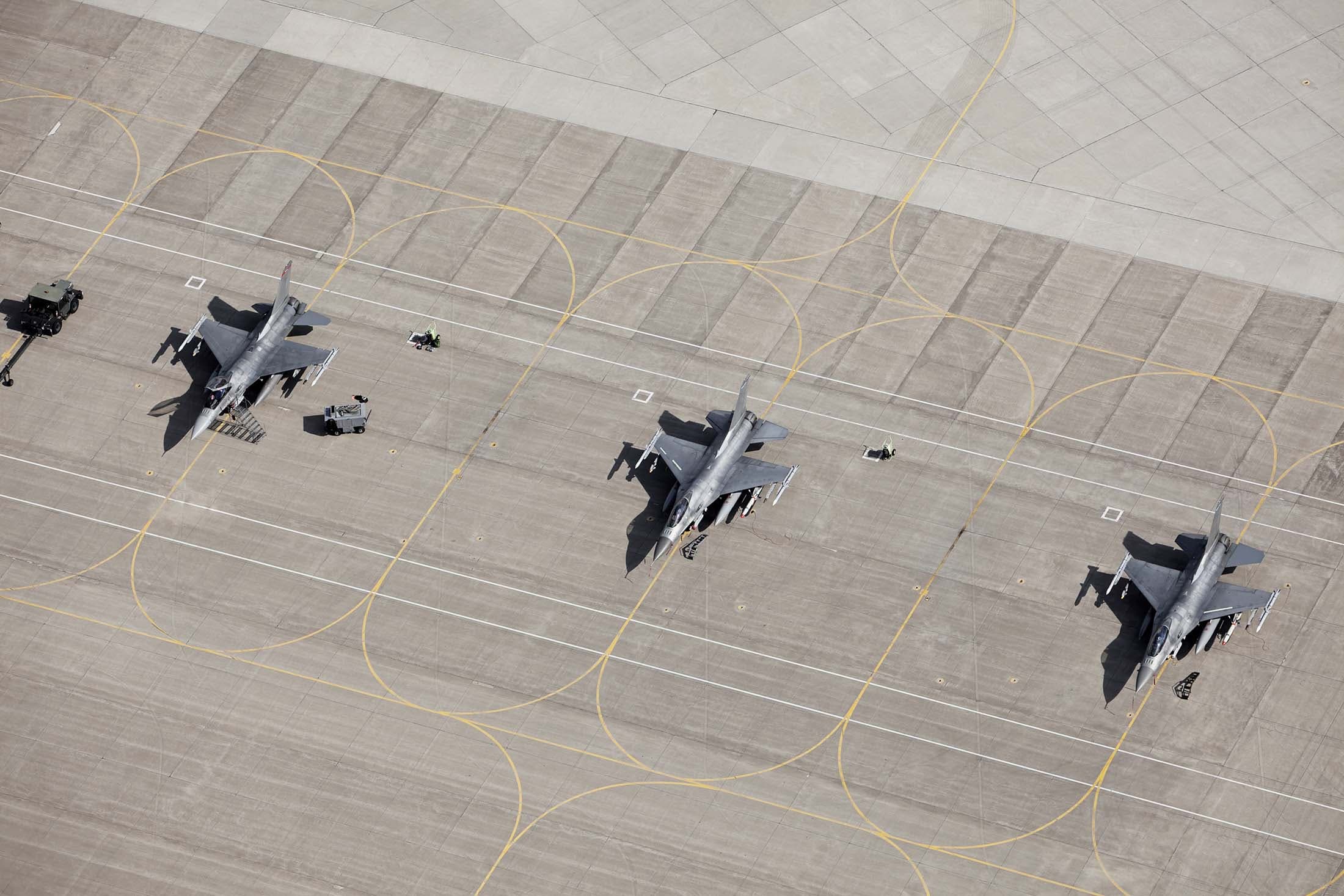 military_jets_at_airbase_small.jpg