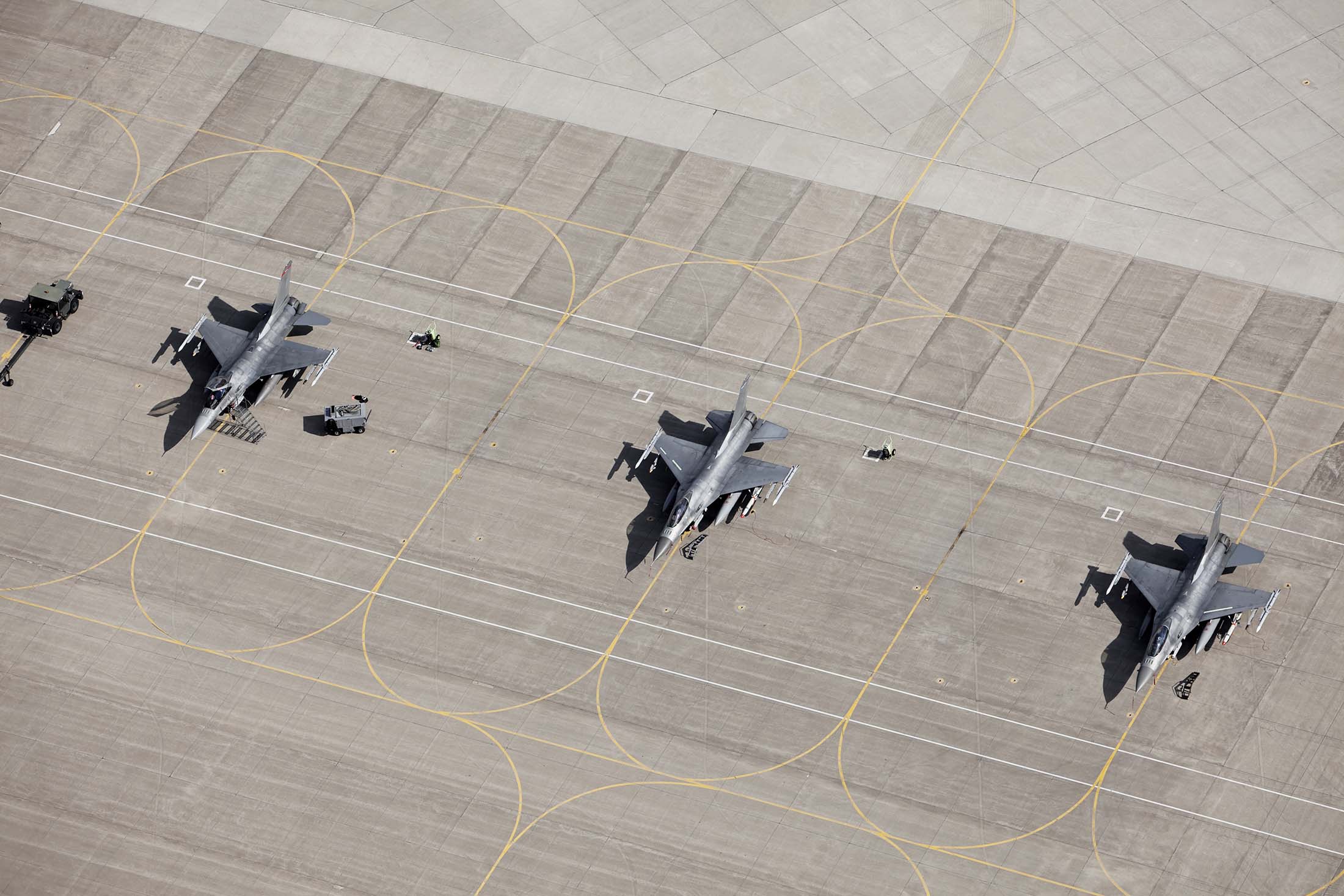 military_jets_at_airbase_small.jpg
