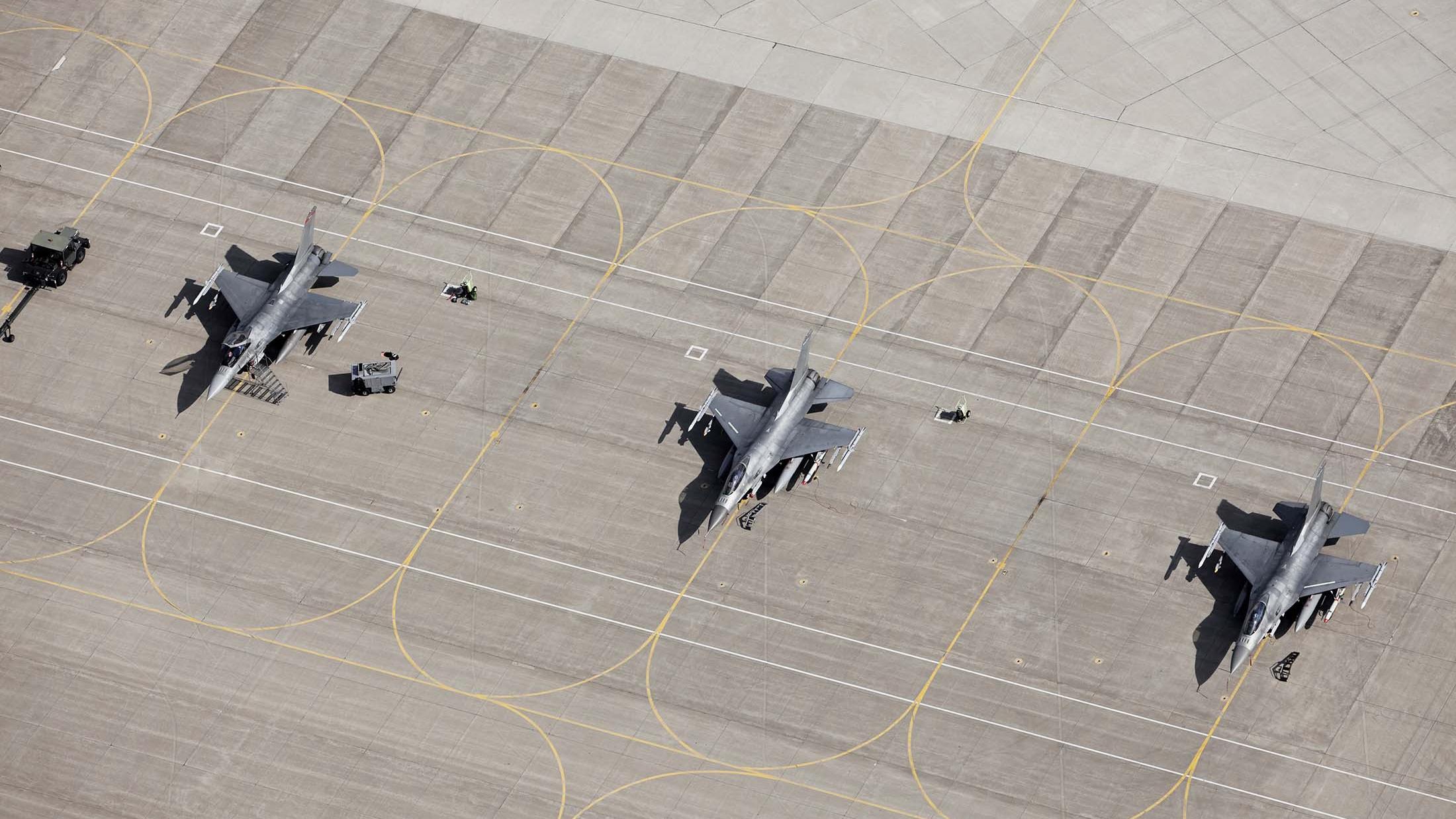 military_jets_at_airbase_small.jpg