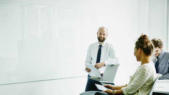 Man presenting in business meeting